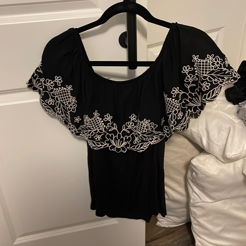 Never worn buckle shirt